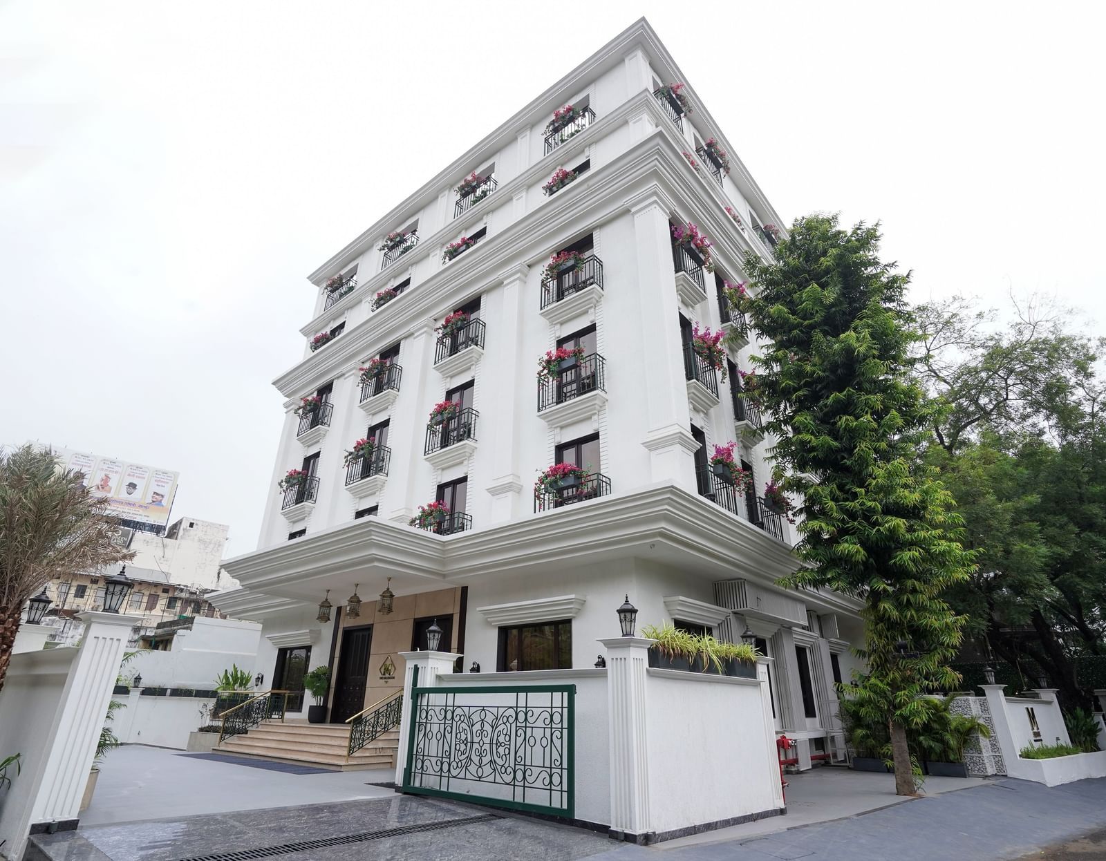 Corner view of M2 Square by Monday Premium featuring a drive way in front of the entrance to the hotel.