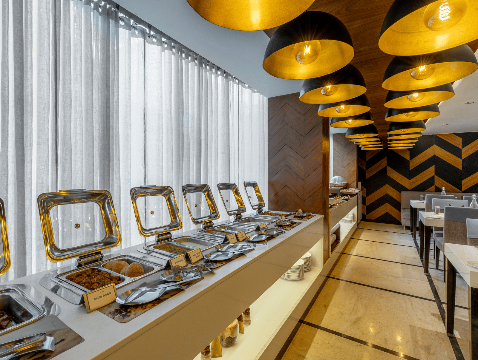  A long buffet counter at the Citrine Hotel with multiple dishes and serving platters.