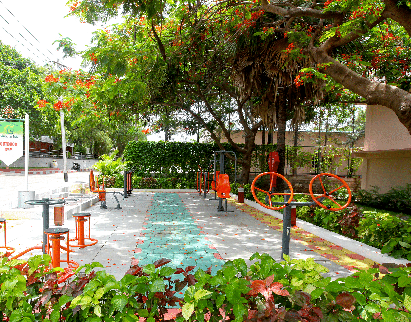 Outdoor games placed under trees at Greens Inn - Fun Activities in Hyderabad.