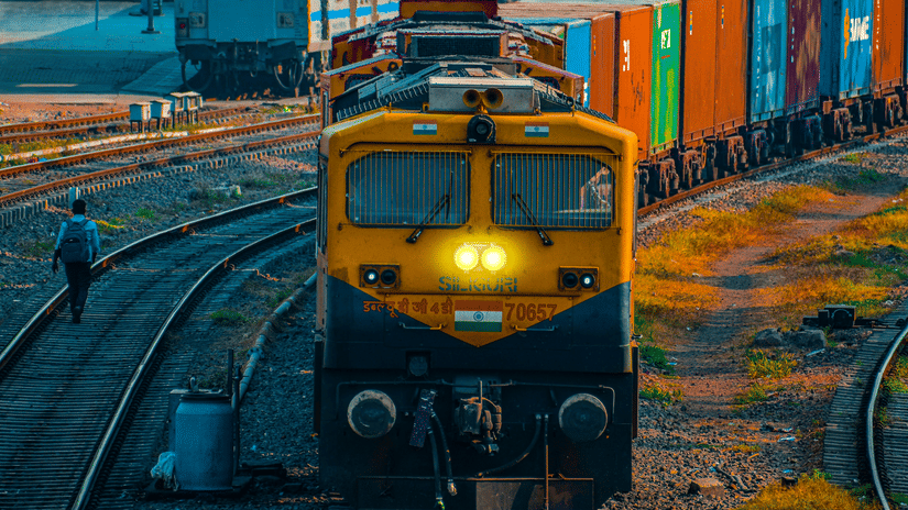Train traveling through a city.
