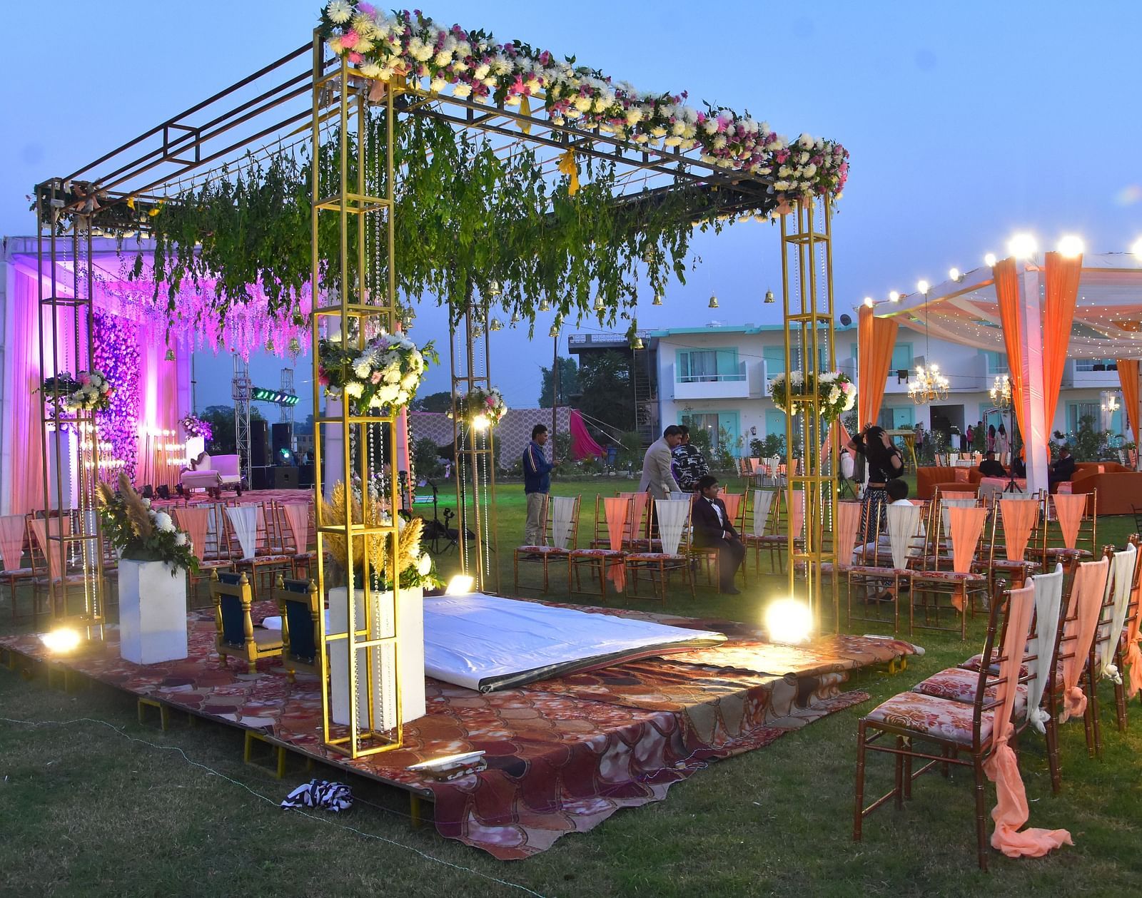Evening wedding lawn decor with floral lights and canopy at Vedikant Resorts The Mallard Corbett.