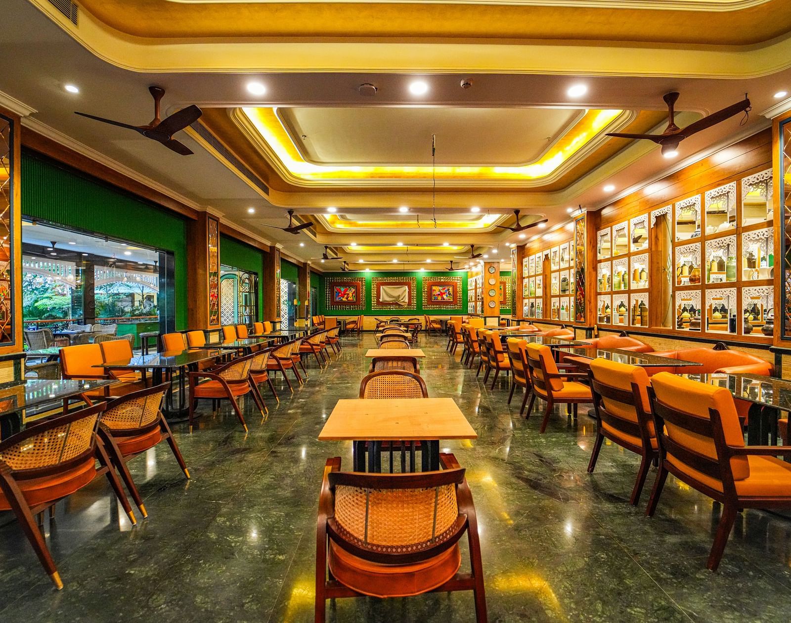  Seating and interior of the  Dining Room at MAYFAIR Oasis Resort & Convention
