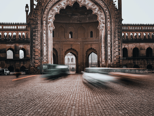 Historic Rumi Darwaza archway in Lucknow with intricate Mughal design.