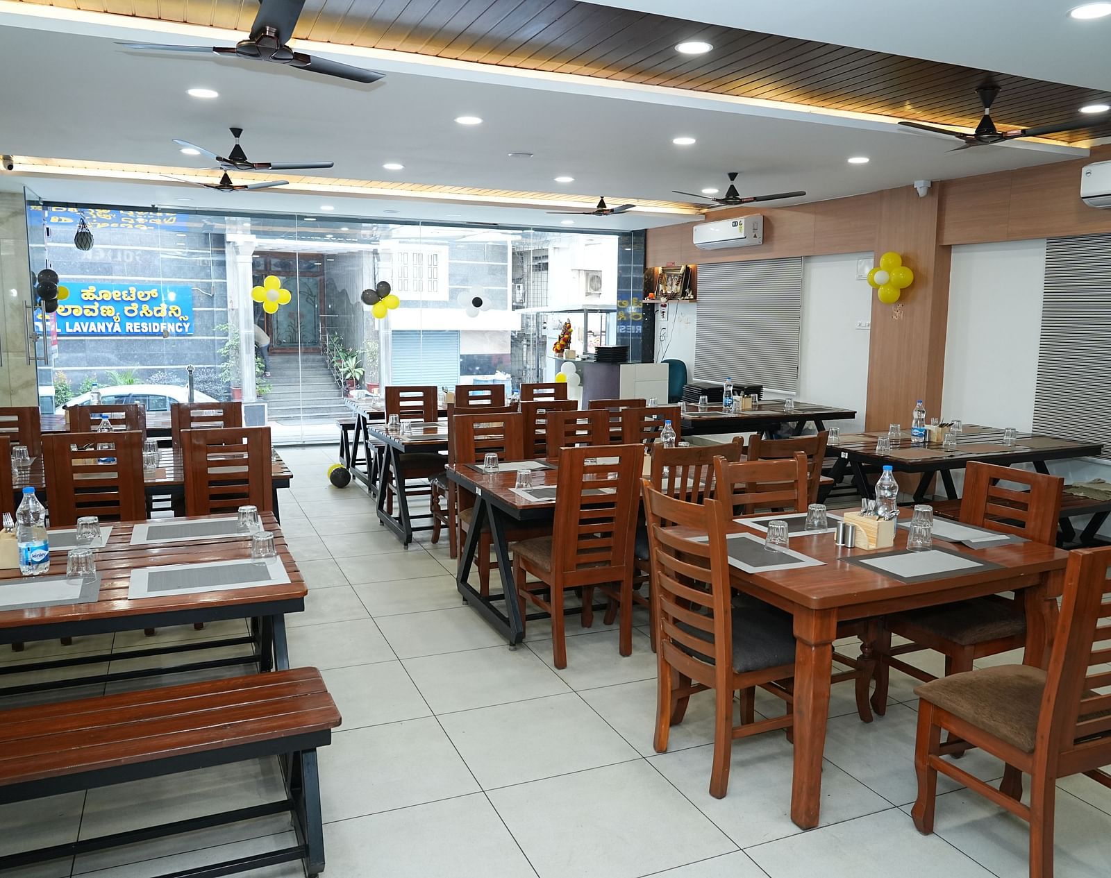 the restaurant at our hotel featuring the entrance made with huge glass windows - Hotel Grand Sigma