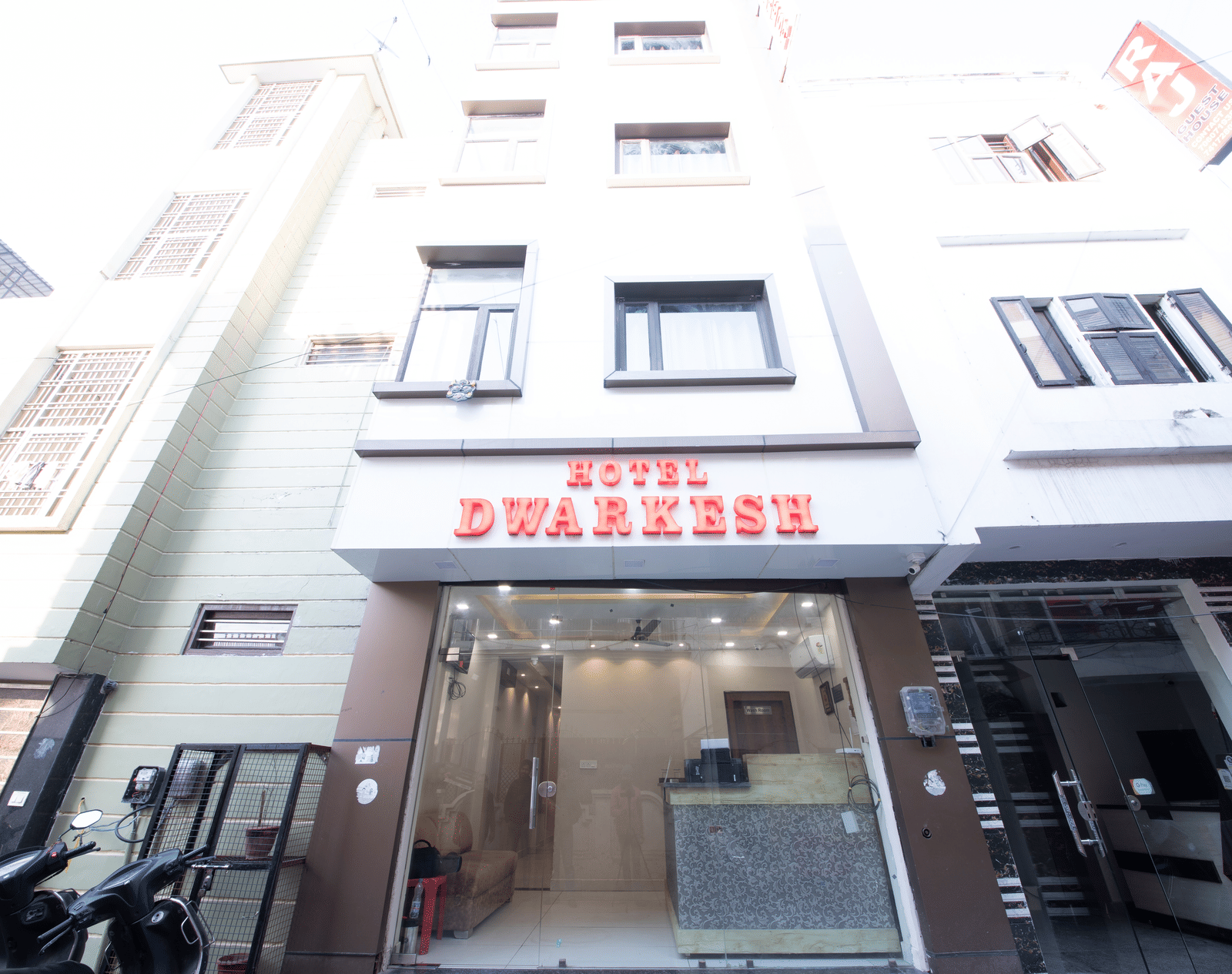 Exterior view of the hotel building entrance at Perfectstayz Value Dwarkesh, Haridwar.