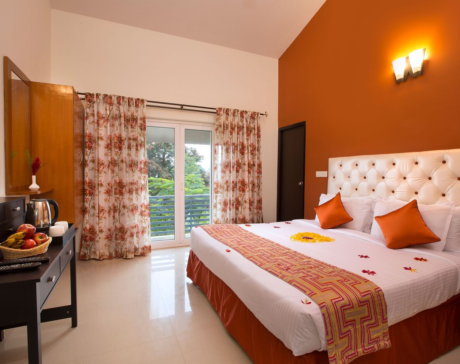 Kairos Room with a double bed, television and work desk and chair