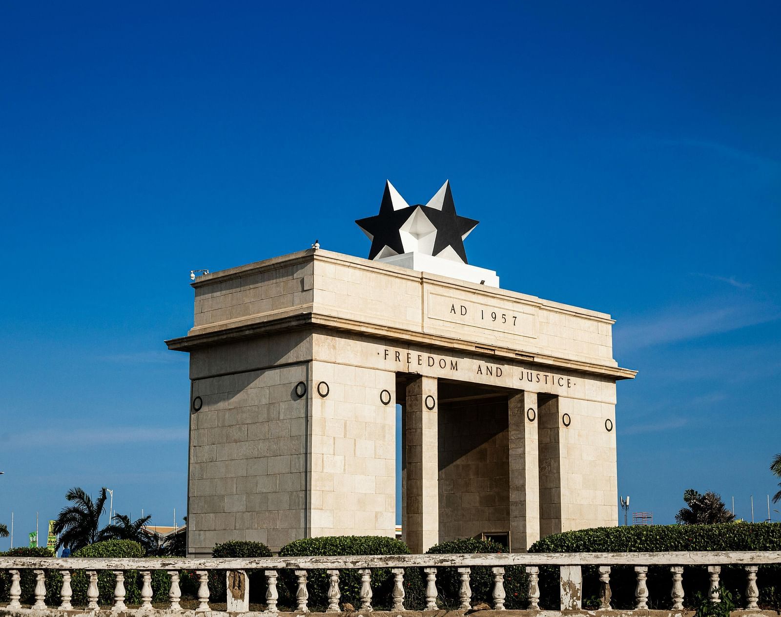 An overview of the Independence Arch in Accra, Ghana, during the day.