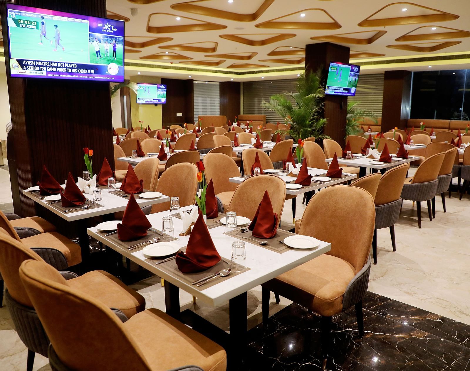 Elegant dining area at Town Square Suites restaurant with stylish seating and fine table settings