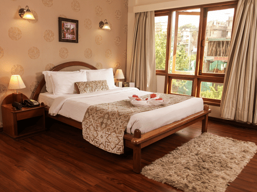 view of a bedroom and a window beside it - Hotel Polo Towers, Shillong