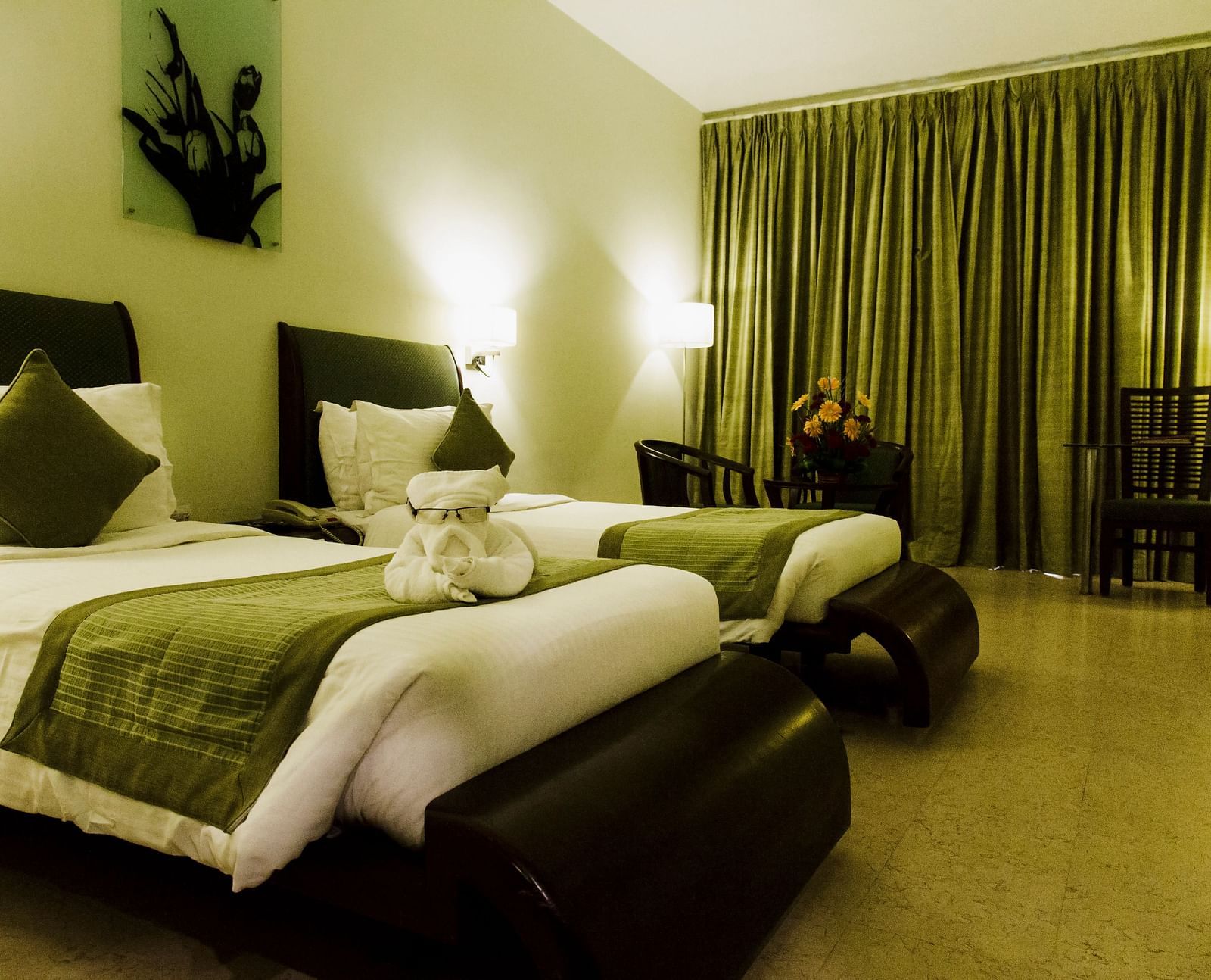 twin beds placed in Superior Room at Hotel Atithi - TGI Grand, Pondicherry