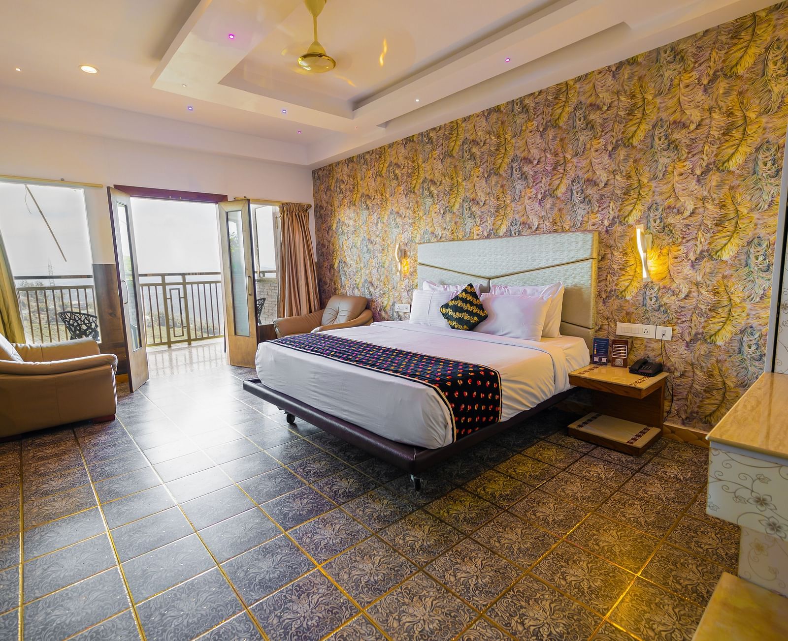 A double bed at the Premium Club Suite at Parakkat Nature Hotel and Resorts Munnar 3