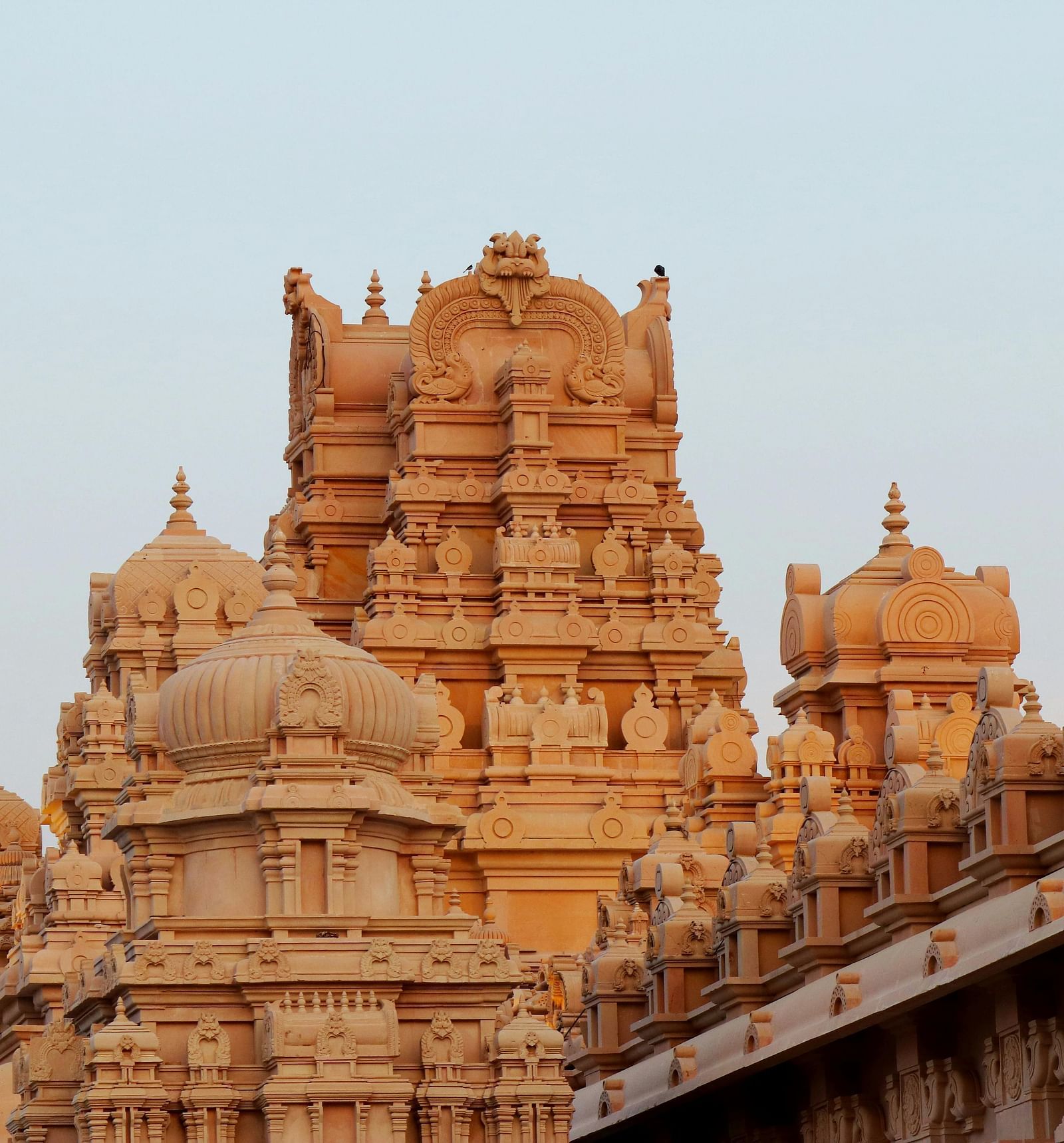 A close-up shot of a temple with multiple spires and intricate carvings.