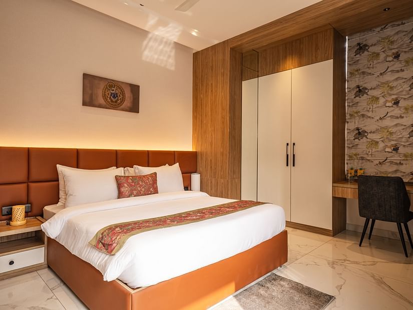 view of a Bedroom in the presidential suite at Triptam Hotel, Vrindavan