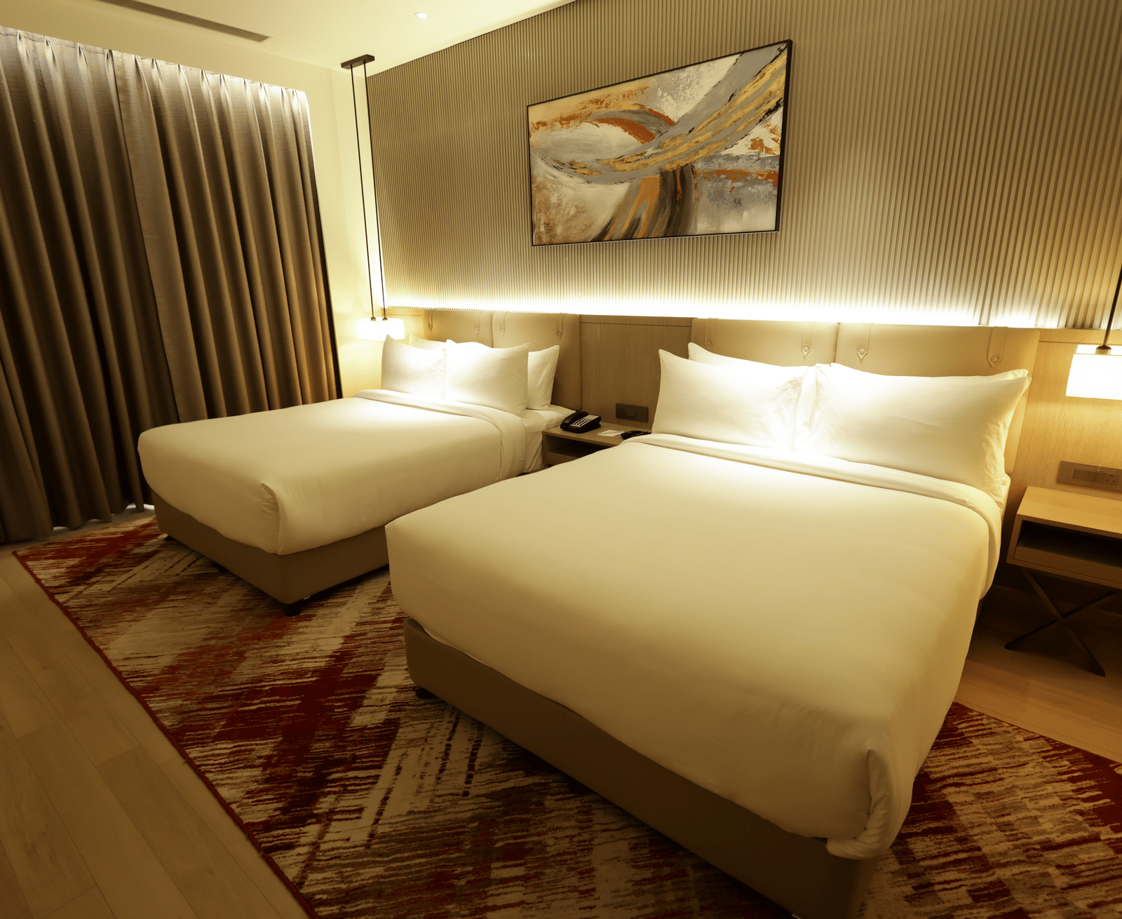 Room with soft lighting and warm tones for a relaxing stay at Ramada by Wyndham Sonipat Murthal