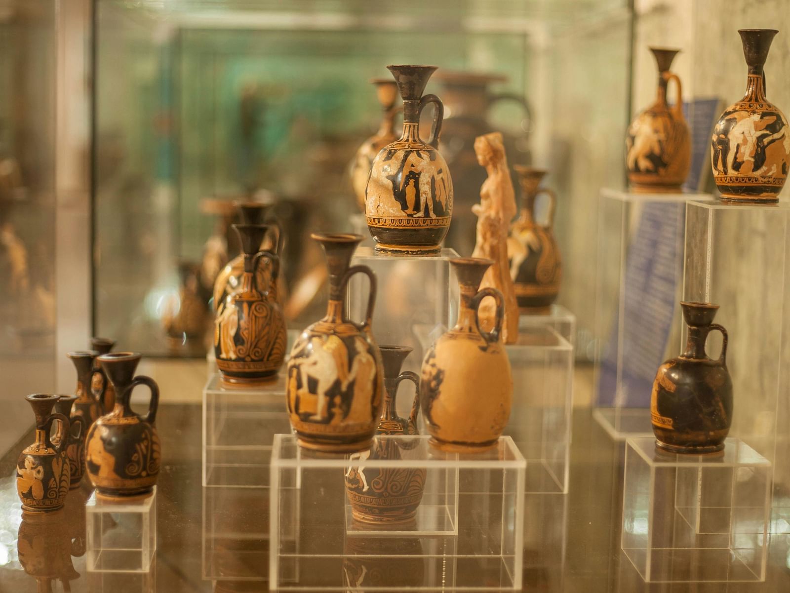 Display of traditional artefacts in a showcase.