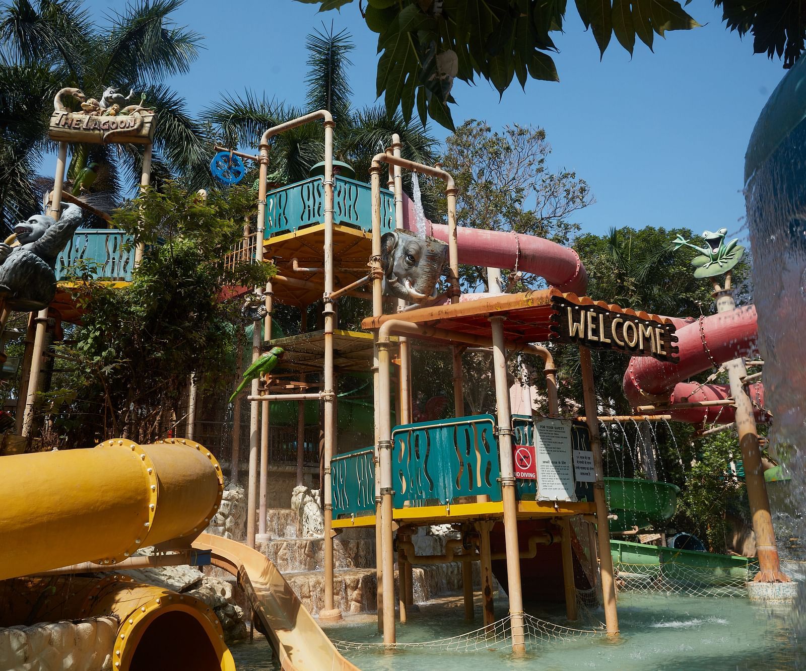 Image of Waterfall at Water Kingdom under clear blue sky