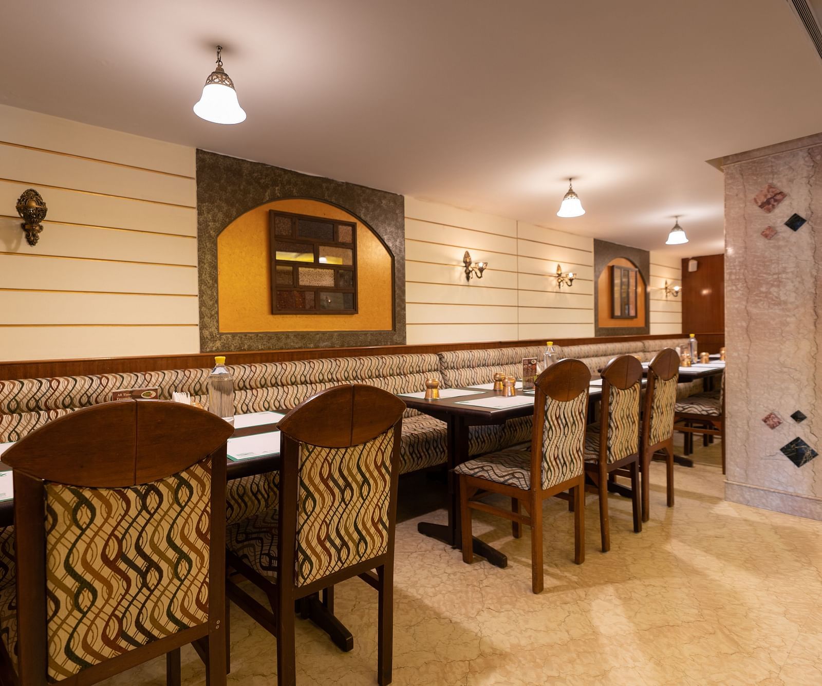 Seating arrangements inside the restaurant - Hotel Pai Comforts, JP Nagar