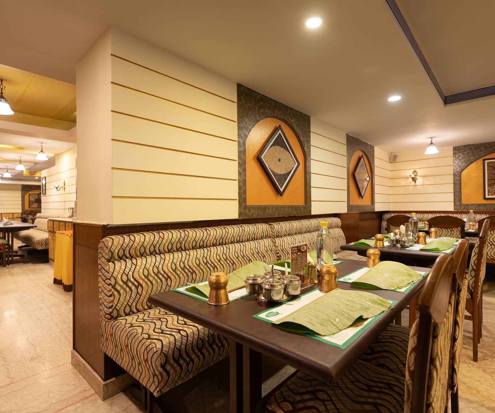 Seating arrangements inside the restaurant - Hotel Pai Comforts, JP Nagar