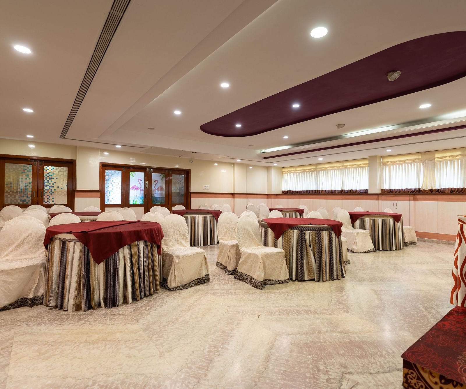 Seating arrangements inside the banquet hall - Hotel Pai Comforts, JP Nagar
