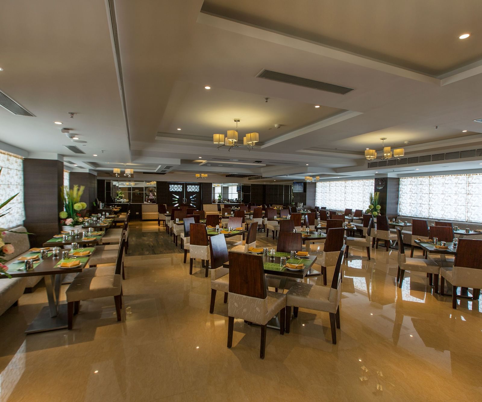 An overview of the seating arrangements inside Plaintain Leaf Restaurant Hotel Pai Viceroy Tirupathi 
