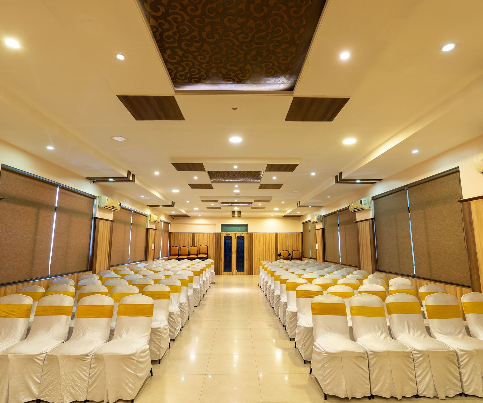 Seating arrangements inside a banquet hall - Hotel Pai Vista, KR Road