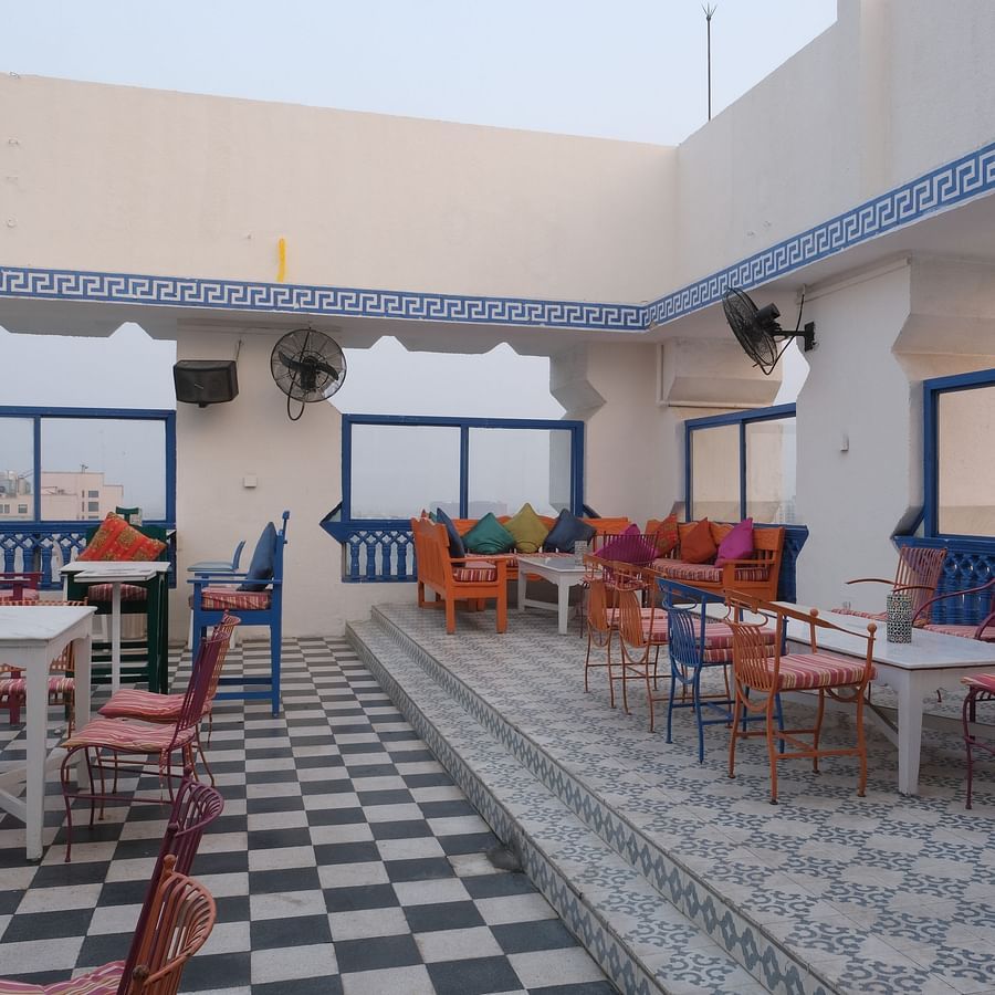 The seating area of ta BLU Rooftop Bar at Clarks Amer, Jaipur