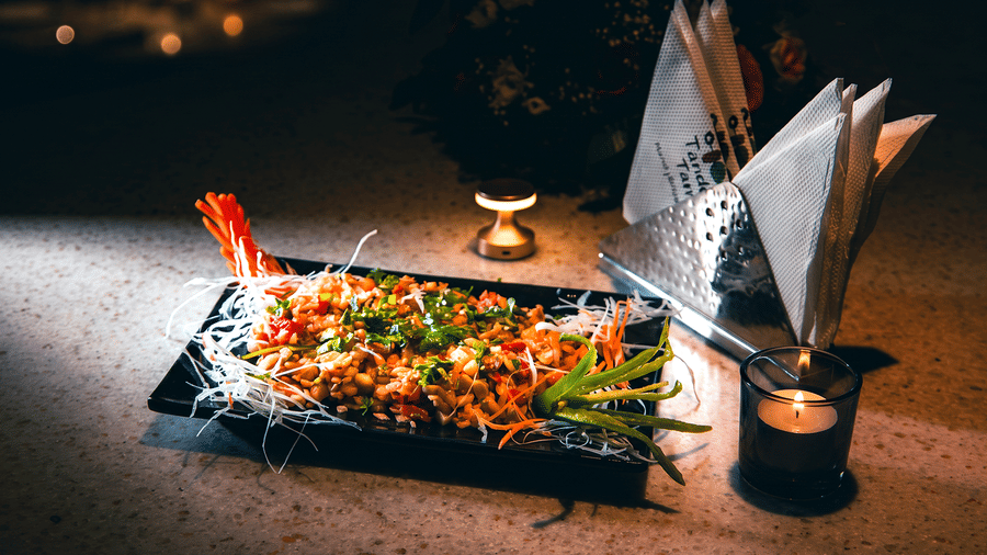 Peanut salad tossed with chopped onion, tomato, coriander and green chilli, served by candlelight at Tandoori Tamashaa, Ilara Hotels & Spa, Tada.