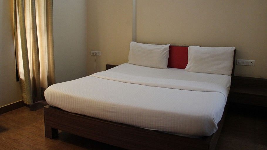 Hotel Arama Suites Bangalore aqua suite bedroom 1 hotel arama suites bangalore