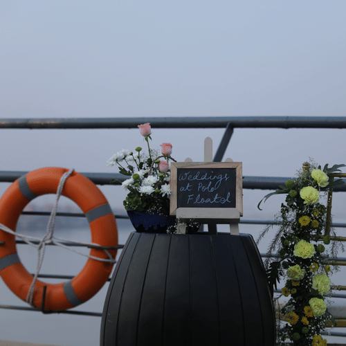 the railing of Polo Floatel that overlooks river hooghly - polo floatel kolkata