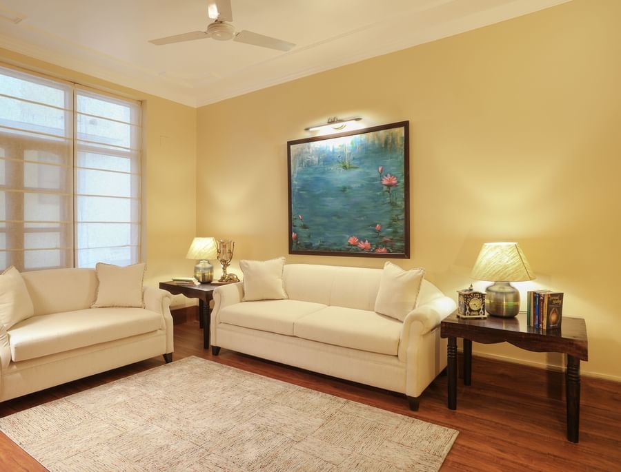 lounge features white sofas in an airy room - Lamrin Boutique Cottages Rishikesh
