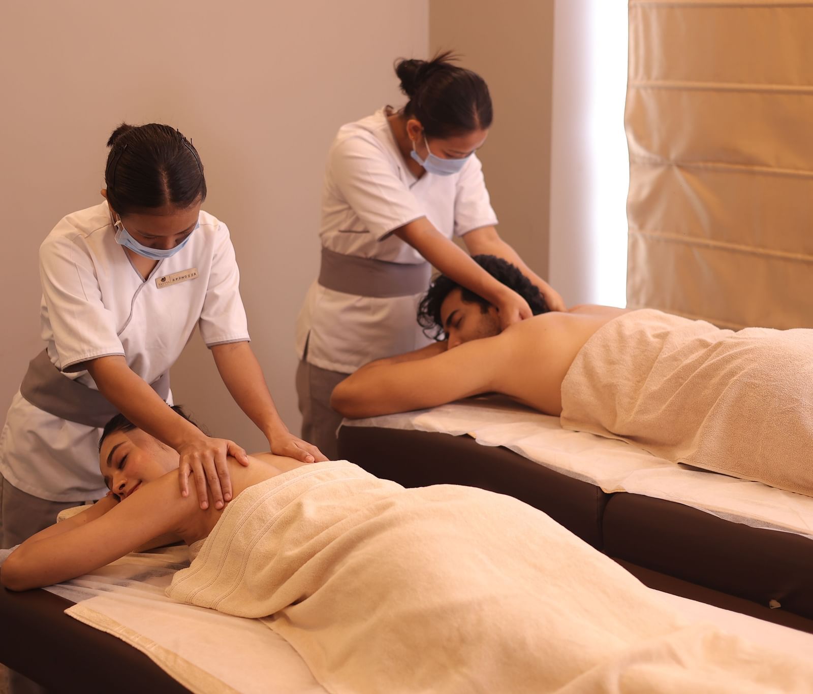 A couple indulging in a massage session at the Tattva spa at Polo Hotel Agartala.