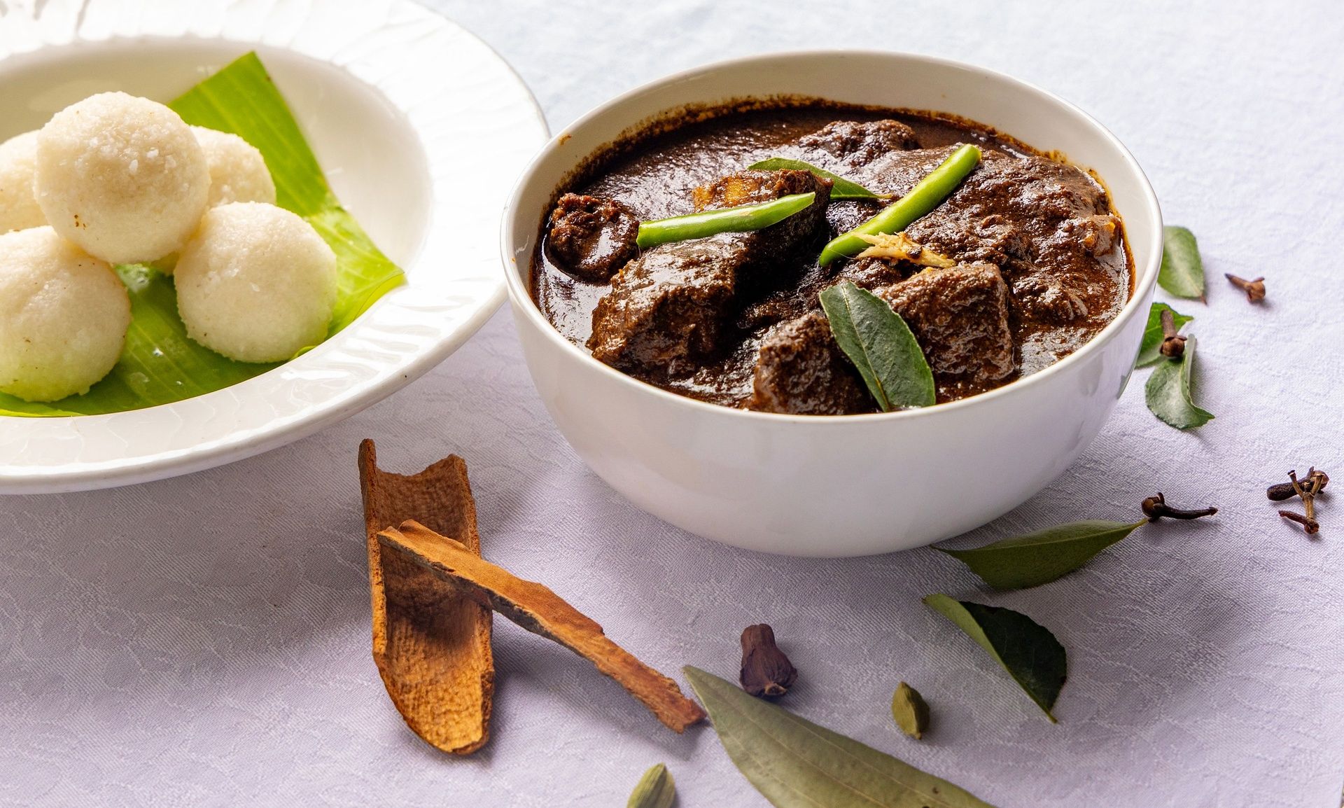 Coorg Pandi Curry with Kadambuttu rice balls.