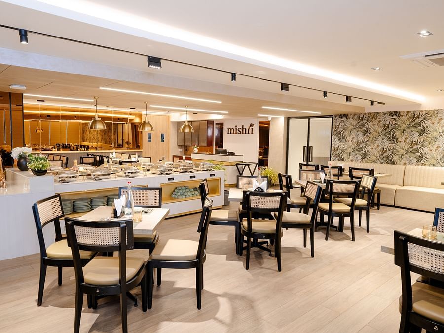 tables at Mishri restaurant at Triptam Hotel, Vrindavan