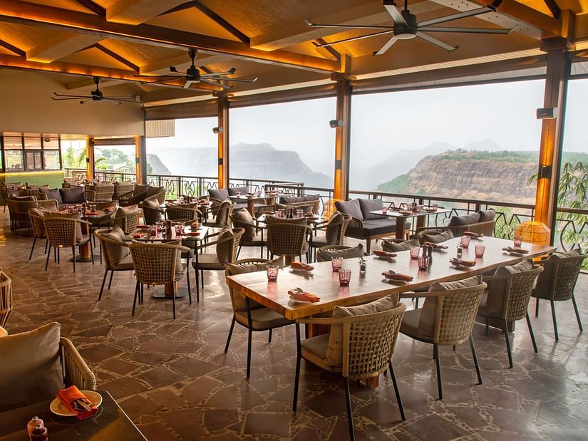 Elegant hill-view restaurant setup at The Dukes Retreat, ideal for scenic dining