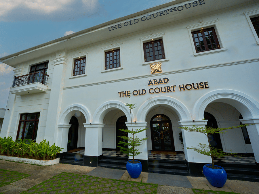 facade image of the old court house by abad, fort kochi