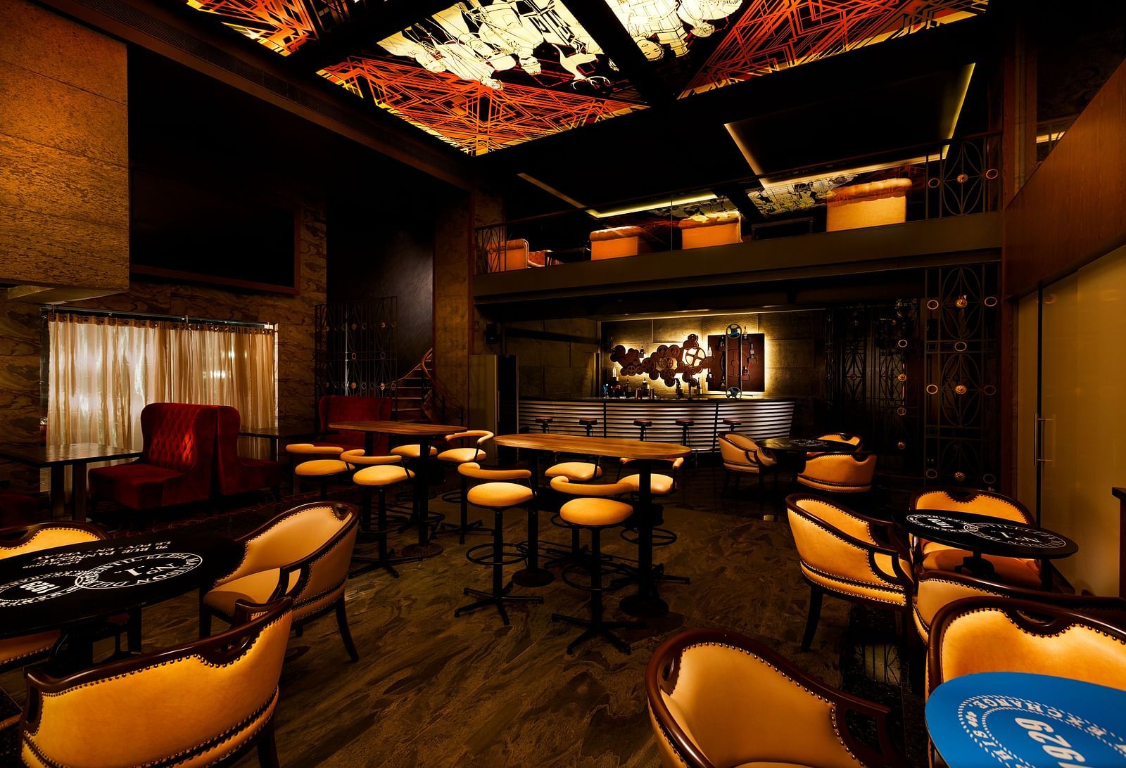 Seating area of Steam and Whistles restaurant at Grand Chennai By GRT Hotels.