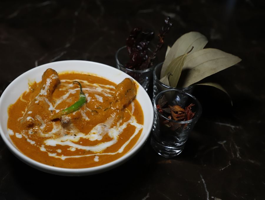 Udman By Ferns N Petals, Chattarpur - dal makhani plated on a restaurant table