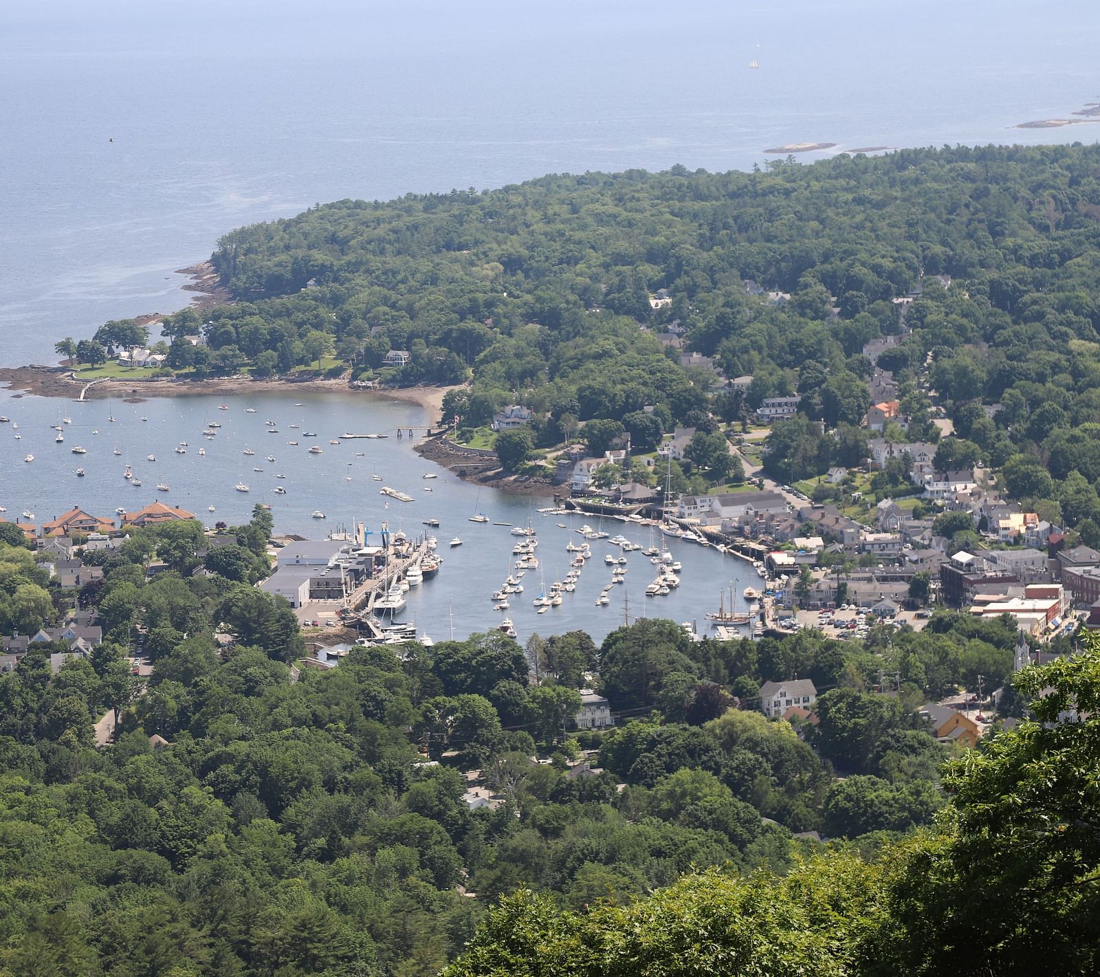 Aerial view of Camden Harbor and surrounding landscape near Hartstone Inn.