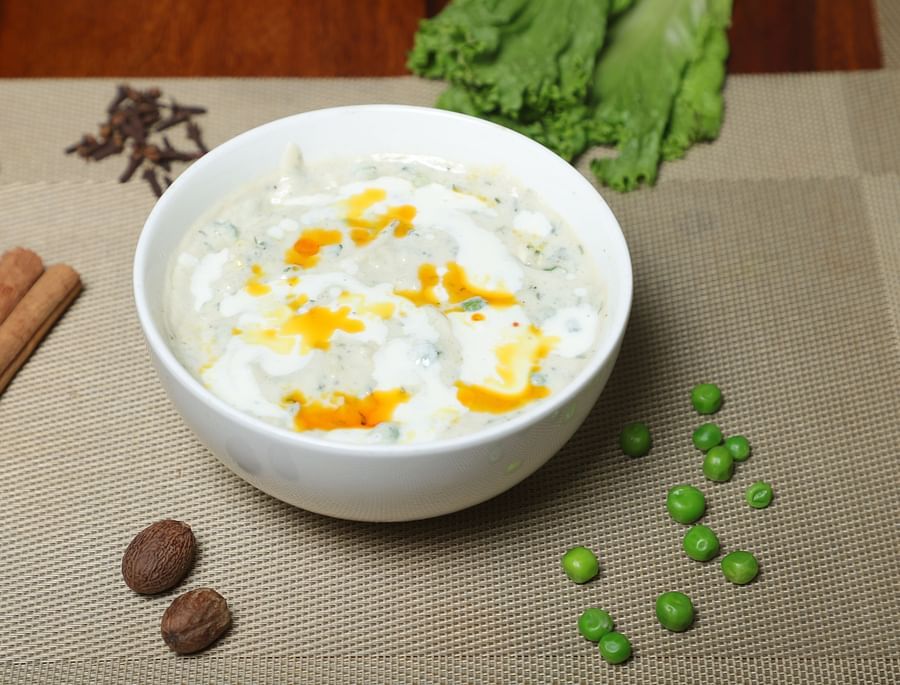An image of a creamy dish garnished with oil served in a bowl at Five Elements Hotel, Jodhpur 