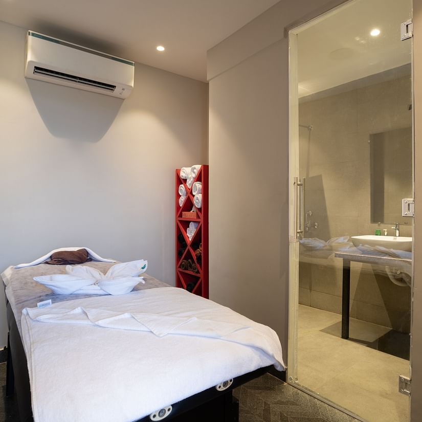 image of the spa featuring an air conditioned room with a wide bed at sibaya beach resort, morjim beach