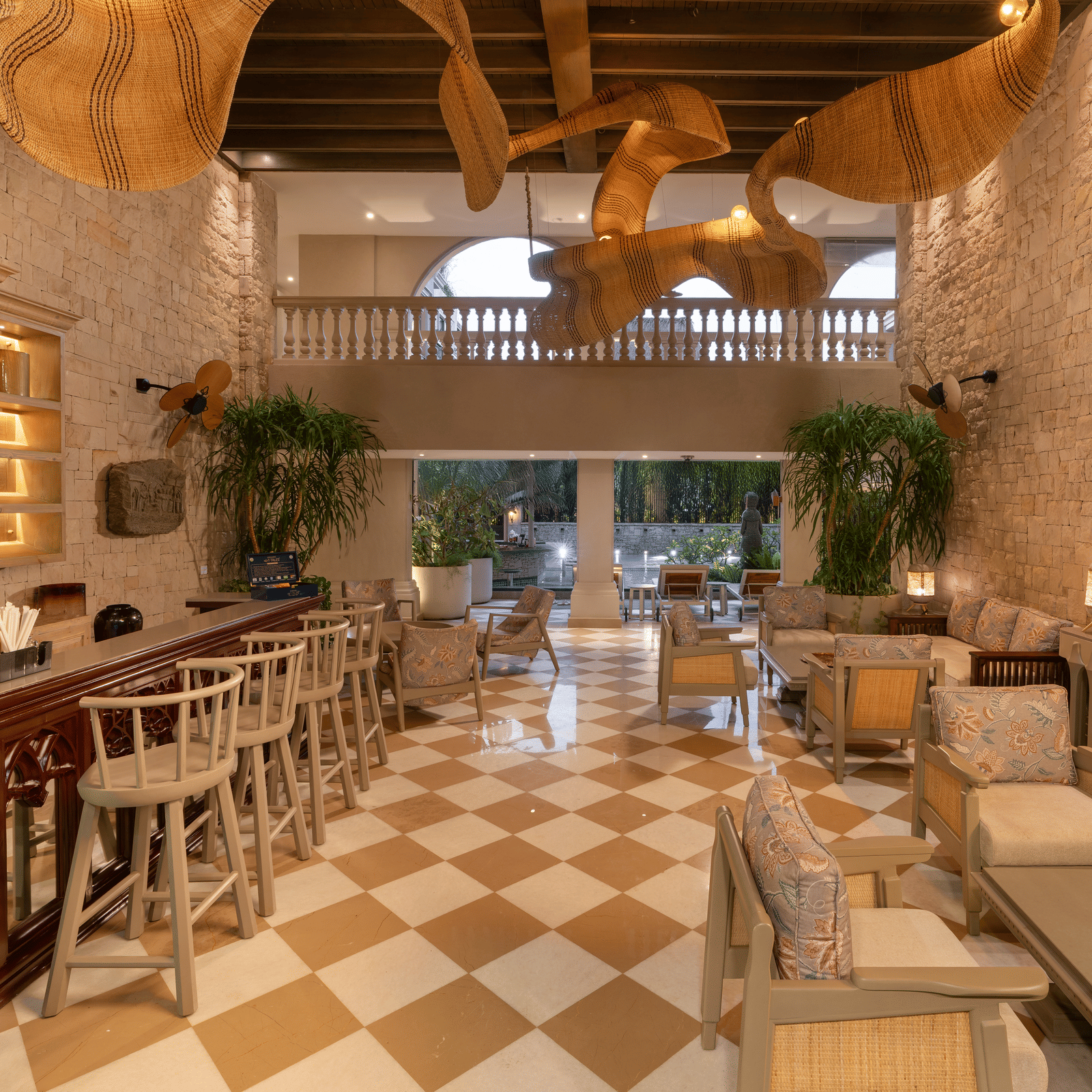 Full view of the Suenos de Cafe featuring a beautiful chandelier hanging from the ceiling.