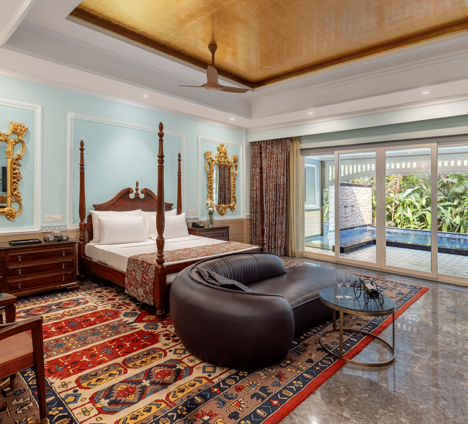 Deluxe Suite bedroom with elegant furnishings at Mayfair Oasis Resort, Jharsuguda