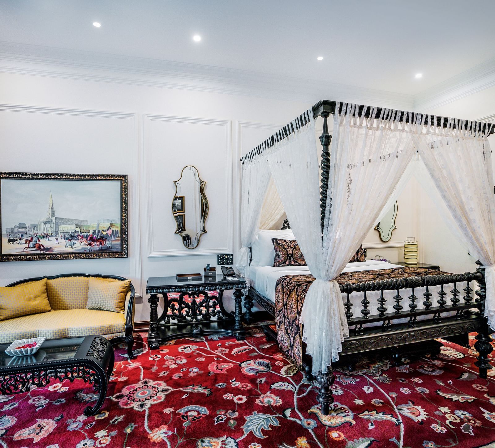 view of a king size bed and a sofa set at its left side - Mayfair Tea Resort, Siliguri