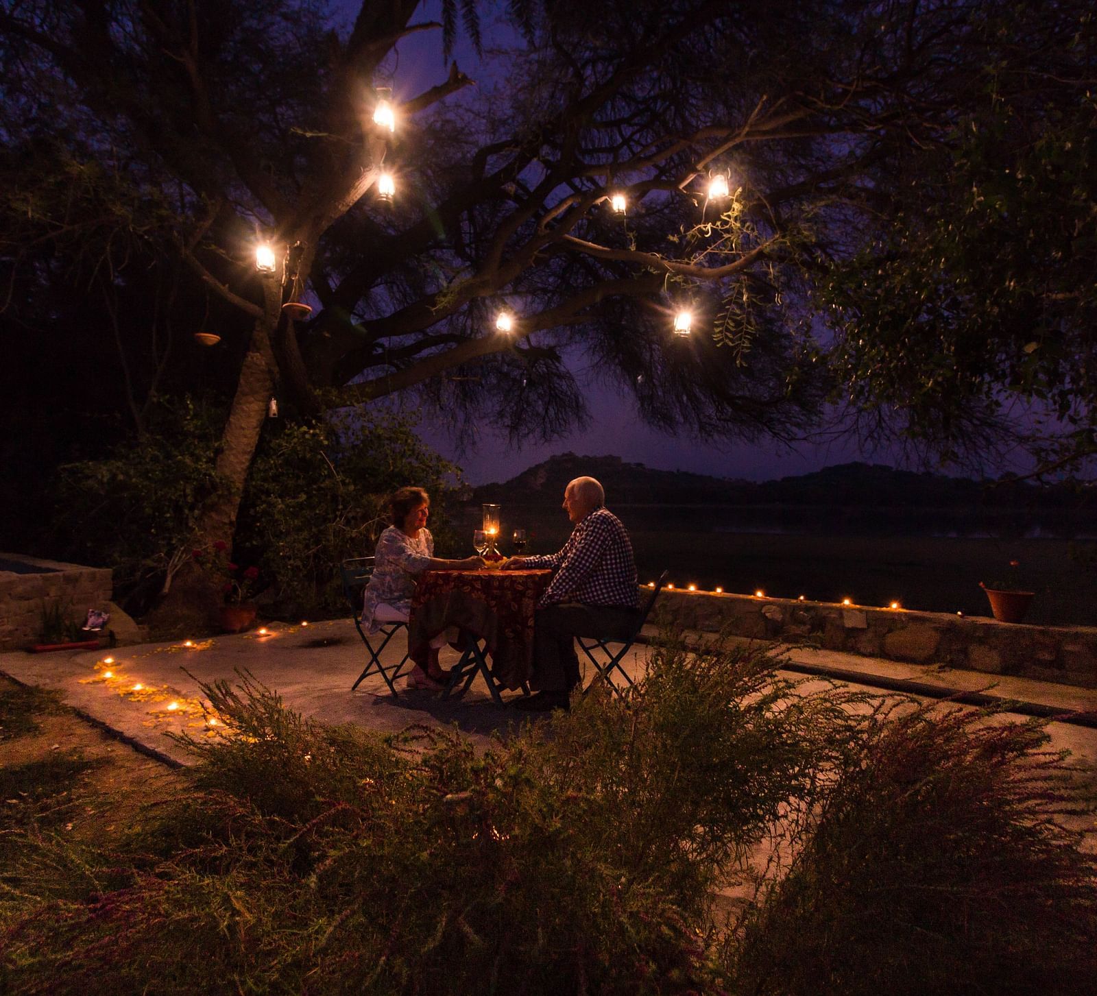 A romantic dinner arrangement at night - Dev Shree, Deogarh