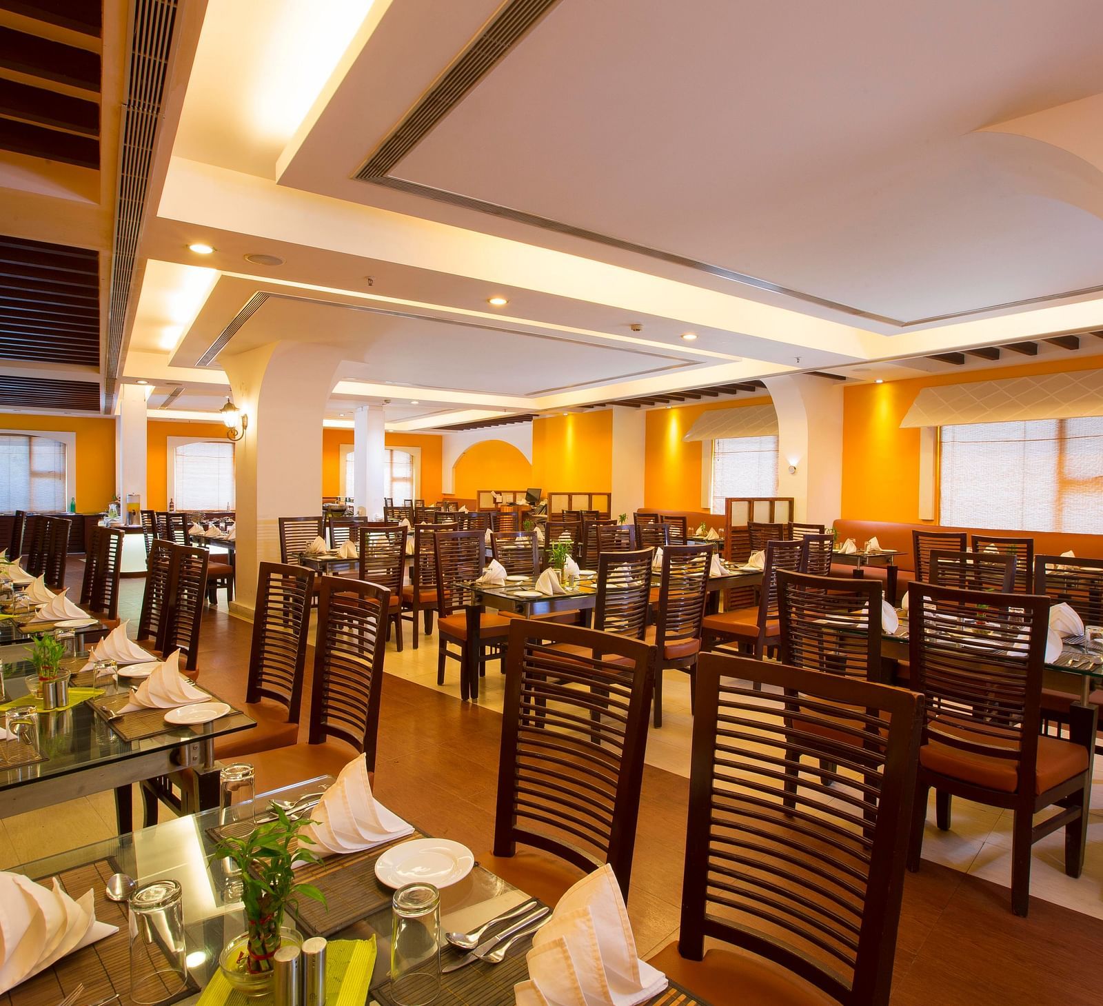 Le Boulevard featuring a dining table at Hotel Atithi - TGI Grand, Pondicherry