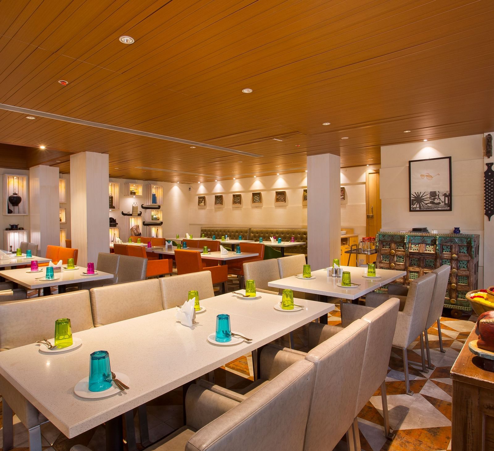 view of a restaurant with rows of rectangular tables with chairs on the long sides - Hotel Fountain Tree By TGI - JP Nagar, Bangalore