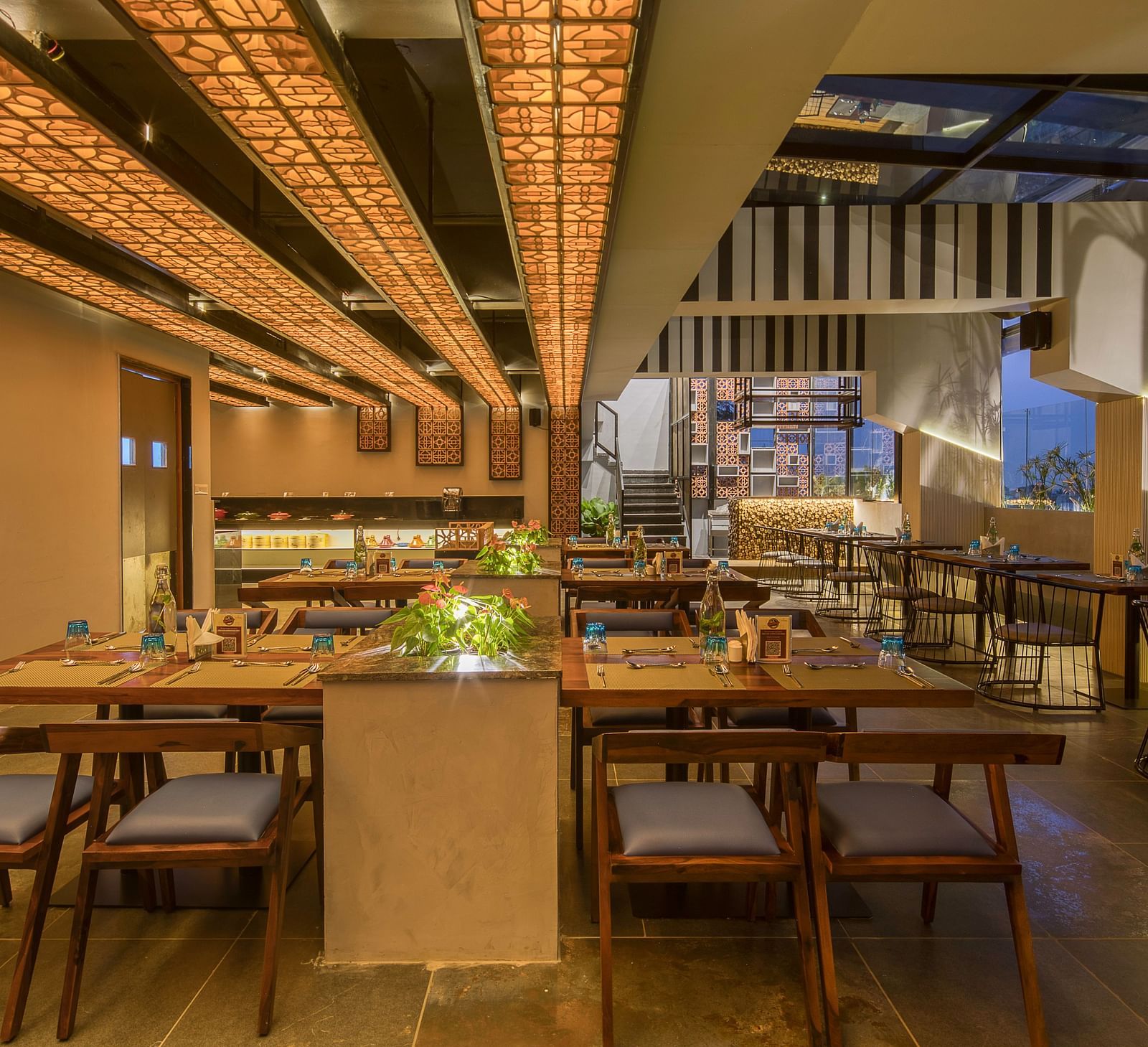Interior seating at Roastopolis Restaurant at Le Foliage by TGI, Bangalore 