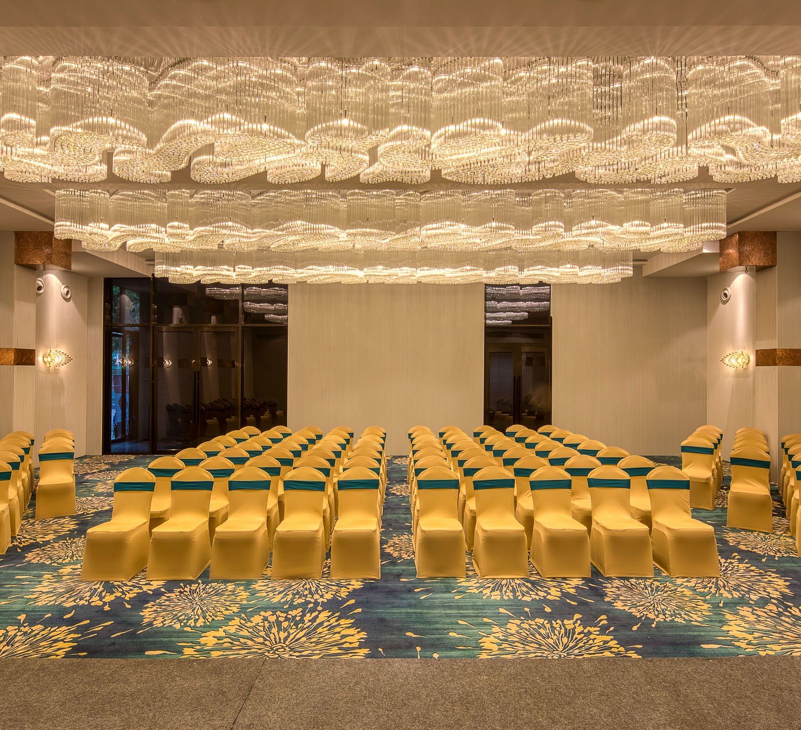 Yellow coloured chairs in the Sumo Anaika Banquet Hall at Le Foliage by TGI, Bangalore