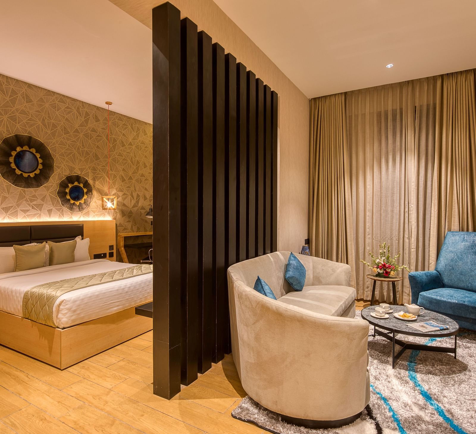 Double bed and the living area in the Sumo Suite at Le Foliage by TGI, Bangalore