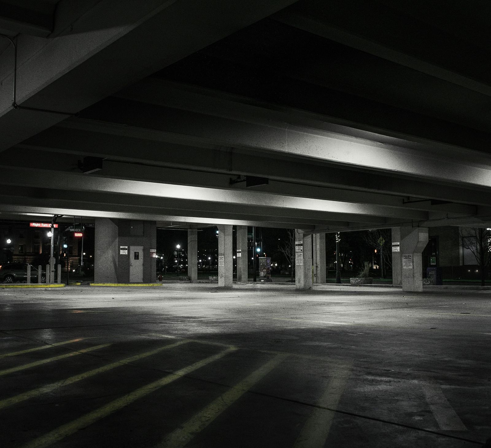 An empty parking lights with lights.